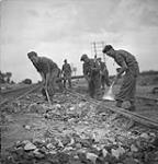 Men from 332 Pioneer Company, British Army, working on the Cherbourg-Paris Railway 08-Jul-44