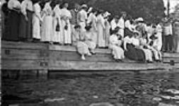 Watching the Regatta from the dock, Rosseau Lake, Muskoka Lakes 12 Aug. 1909