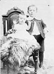 Georges P. Vanier (1888-1967) with his sister Eva, when children ca. 1894 - 1895