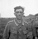 "Close-up of a Jerry prisoner captured near Otterloo" after a German counter-attack towards Otterloo, in an attempt to cut the 5 Canadian Division spearhead 17 Apr. 1945