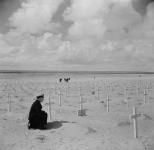 Warrant Engineer Evans, H.M.C.S. UGANDA, at cemetery 2 Feb. 1945