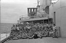 Infantrymen of "C" Company, Royal Rifles of Canada, aboard H.M.C.S. PRINCE ROBERT en route to Hong Kong, 15 November 1941 November 15, 1941.