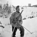 Trooper E.C. Taciun, Ontario Regiment, a member of the ski party that carried food and medical supplies to stranded British troops of the 36th Reconnaissance Regiment (British Army). Tornareccio, Italy, 15 February 1944 February 15, 1944