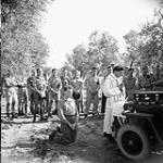 Personnel of the Three Rivers Regiment attend mass being celebrated by an Italian priest who had previously served as a chaplain in the Italian Army, Termoli, Italy, 11 October 1943 October 11, 1943