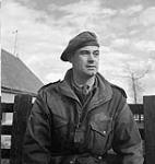 Major E.T. Jacques, Second in Command of the Régiment de Maisonneuve, who wears a Denison smock, Ossendrecht, Netherlands, 17 October 1944 17-Oct-44