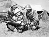 Officers of the Royal Canadian Artillery (R.C.A.), 3rd Canadian Infantry Division, taking part in Exercise MANNER II near Salisbury, England, 20 April 1944 April 20, 1944.