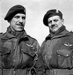 Lieutenants Joseph Philippe Rousseau (left) and Joseph Maurice Rousseau, 1st Canadian Parachute Battalion, at a transit camp near Down Ampney, England, 13 February 1944. Both officers were later killed in action, Philippe on 7 June 1944 and Maurice on 20 September 1944 February 13, 1944
