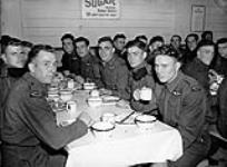Paratroopers of "C" Company, 1st Canadian Parachute Battalion, who took part in the Fourth Victory Loan parade in the mess hall at Lansdowne Barracks, Ottawa, Ontario, Canada, 4 May 1943 May 4, 1943.