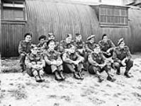Candidates from the Canadian Army Overseas who completed their British parachute training at No. 1 Parachute Training School, Royal Air Force (R.A.F), at Ringway in anticipation of service with the First Special Service Force at a Non-Effective Transit Depot in England, 1942 1942.