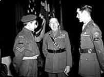 General H.D.G. Crerar attending an investiture at the Civic Auditorium, Winnipeg, Manitoba, Canada, 13 January 1946 January 13, 1946.