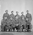 Chinese-Canadian soldiers from Vancouver, British Columbia, Canada, who served with the South East Asia Command (SEAC), awaiting repatriation to Canada, No.1 Repatriation Depot (Canadian Army Miscellaneous Units) November 27, 1945.
