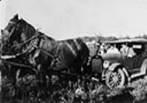 W.L. Mackenzie King driving the Bennet buggy in Sturgeon Valley n.d.