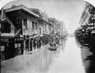 Flood in Montreal, Notre Dame Street looking west from McGill Street Apr. 1886