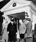 Rt. Hon. W.L. Mackenzie King greeting Rt. Hon. and Mrs. Winston Churchill and their daughter Mary during the Quadrant Conference 10 Aug. 1943