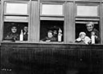 Scottish immigrants on board train c.a. 1911