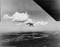 [Fairchild FC2W aircraft G-CYXP of the R.C.A.F. over Lake of Two Mountains, P.Q. Taken 1928-1935.] 1928-1935