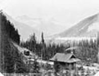Hermit Range from hotel showing C.P.R. (Canadian Pacific Railway) station ca. 1880s.