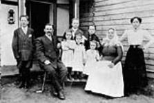 "Gregory Koziak and family, Skaro, Alberta. [Left to right]: Nicholas, Gregory, Mary, William, Catherine, John, Sophie, Mary, Eva." "1913"