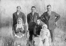 [Members of Dmytro Yuzyk's family on his farm at Rhein, Saskatchewan.] [1917]