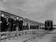 Funeral train carrying the body of Rt. Hon. W.L. Mackenzie King en route to Toronto for burial in Mount Pleasant Cemetery 26-Jul-50