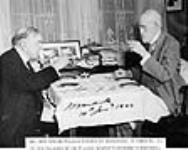 Rt. Hon. W.L. Mackenzie King having breakfast with Sir William Mulock on Sir William's hundredth birthday 19 Jan. 1944