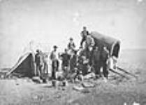 Half-breed [Métis] traders with members of the North American Boundary Commission ca. 1873