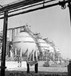 View of Horton Spheres used to store butadiene in the buna-S area of the Polymer Rubber Corporation yard Oct. 1943