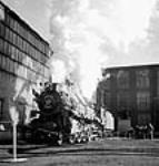 View of first of 145 "X-Dominion" locomotives pulling out for its test run Nov. 1943
