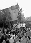 View of the crowd gathered to witness a ship launch at the Burrard yards 21 oct. 1944