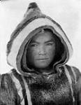 Inuit child wearing a caribou parka 1929.