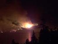 Night view of Okanagan Mountain fire near the edge of Okanagan Lake Aug 2003