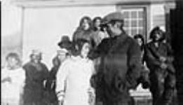 Nuqallaq, who killed the fur trader Robert Janes, reunited with his wife Ataguttiaq on returning to Pond Inlet after his release from Stony Mountain Penetentiary and Dynevor Hospital in Manitoba 3 September 1925