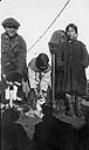 Kakto with his wife and child aboard C.G.S. Arctic August 1923