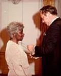 Marie Hamilton receiving the Governor General's award commemorating the Persons Case November 1, 1983