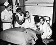 Miss L. Jamieson of Durham, ON, supervising practical nursing in the wards at Patna, India c 1960