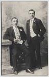 H.M.C.S. Niobe [Portrait of two unidentified men in suits] 1910-1915