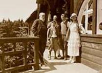 Senator Gaston Menier, Madame Georges (Simone) Menier, her sons with Georges? Menier in the background on the steps of Château Menier vers 1923