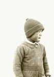 Profile of an unidentified Inuk boy wearing a knitted hat [graphic material] 1926