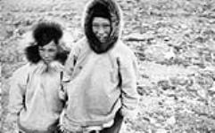 Two Inuit boys, both wearing their hoods [graphic material] 1947