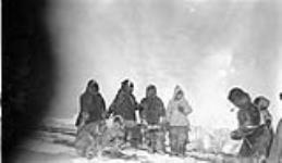 Group of Inuit with their sled [graphic material] ca. 1926 - 1943.