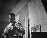 Portrait of Jack Nichols with Mandolin [graphic material] ca. 1950-1955.