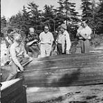 Jack Nichols with artist friends on Jackman's Island [graphic material] ca. 1950-1955?.