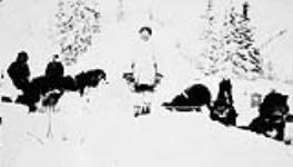 Photograph of Inuit boy with his team of Huskies [graphic material] ca. 1930-1943