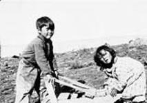 Unidentified Inuit boy and girl [graphic material] ca. 1930-1943