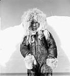 Inuk boy in caribou clothing 1949