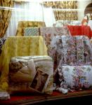 Store window display of various fabrics on Queen Street West 1976-1978.