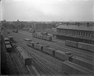 MCRR Station and yards panorama long caboose 1900-1925