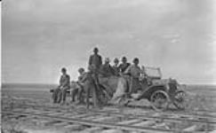Ford motor car converted for track use on ED & BC between Grande Prairie and Spirit River July 9, 1916.