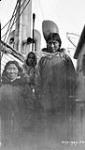 [Inuuk women with a child on board a ship at Forsyth Bay] Original title: Natives at Forsyth Bay 1927