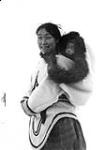 [Inuk woman with a baby] 1942-1944.